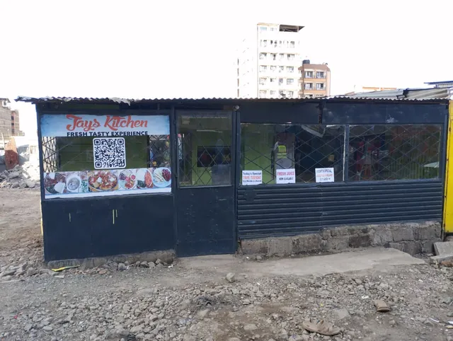 Jays Kitchen in daylight, with the day’s specials posted in the windows
